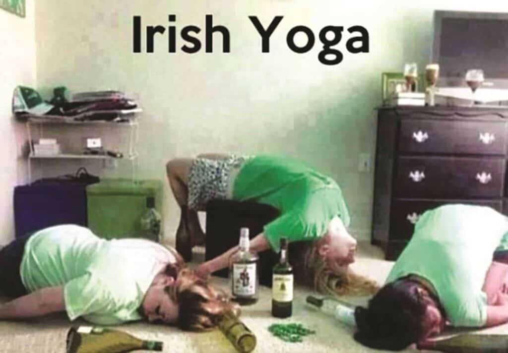 A group of people doing irish yoga on the floor