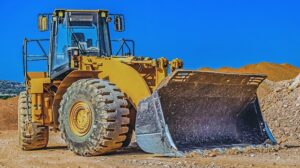 A large bulldozer on a dirt road