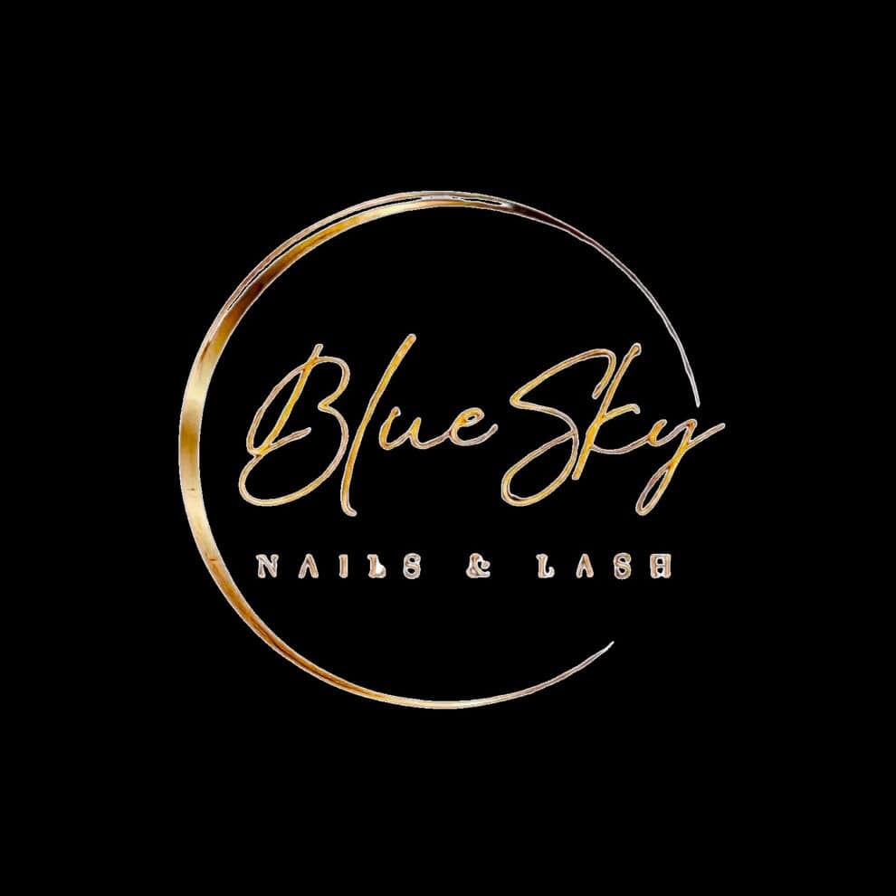 Logo for Blue Sky Nails & Lash, featuring the business name in cursive inside a golden circular design against a black background.
