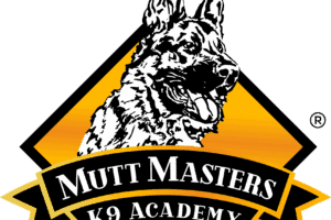 Logo for Mutt Masters K9 Academy featuring an illustration of a German Shepherd dog with text "Mutt Masters K9 Academy" on a ribbon below.