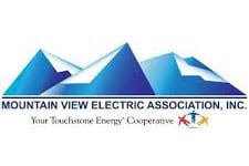 A logo featuring blue mountain peaks and the text “Mountain View Electric Association, Inc. Your Touchstone Energy Cooperative” with a small colorful graphic of human figures holding hands below.