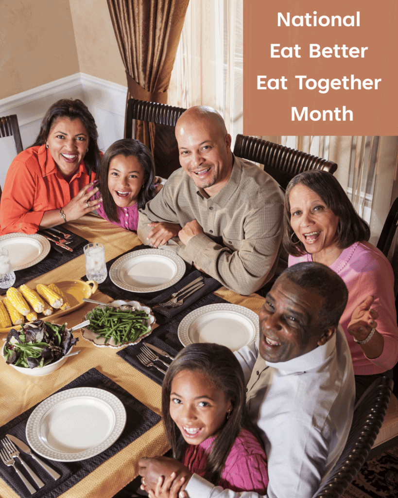 A family of six sits around a dinner table with plates of vegetables, smiling at the camera. Text reads: "National Eat Better Eat Together Month.