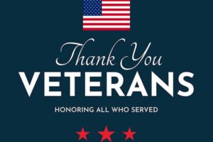 A graphic with an American flag, the text “Thank You Veterans,” “Honoring All Who Served,” and three red stars on a dark blue background.
