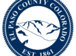 Seal of El Paso County, Colorado, showing stylized mountains in the center, surrounded by a rope border and the text “El Paso County Colorado Est. 1861.”