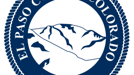 Seal of El Paso County, Colorado, showing stylized mountains in the center, surrounded by a rope border and the text “El Paso County Colorado Est. 1861.”